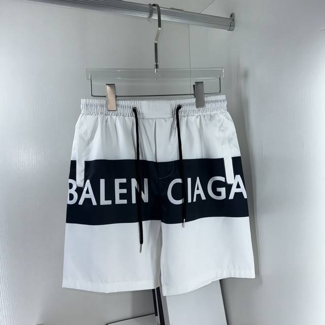 Balenciaga巴黎世家 夏季新品 最新款沙滩裤、定制品牌绳头，做工细节无可挑剔、完美出品、进口机直喷数码印，专柜高科技速干纤维尼龙面料、清爽舒适、型男必备