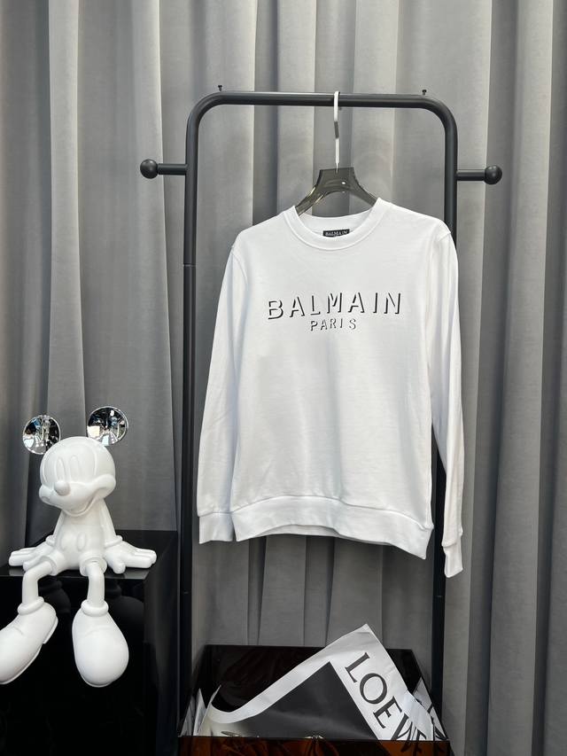 Balmain 巴尔曼 24Ss新款潮流经典卫衣，精致裁剪，高品质工艺！采用定织定染纯棉面料420克左右纯棉卫衣面料！图案进口数码印花工艺，耐穿耐洗久穿不变型，