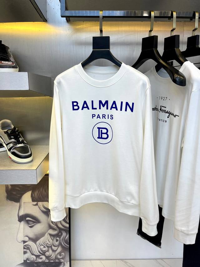 Balmain 巴尔曼 24Ss新款潮流经典卫衣，精致裁剪，高品质工艺！采用定织定染纯棉面料420克左右纯棉卫衣面料！图案进口数码印花工艺，耐穿耐洗久穿不变型，