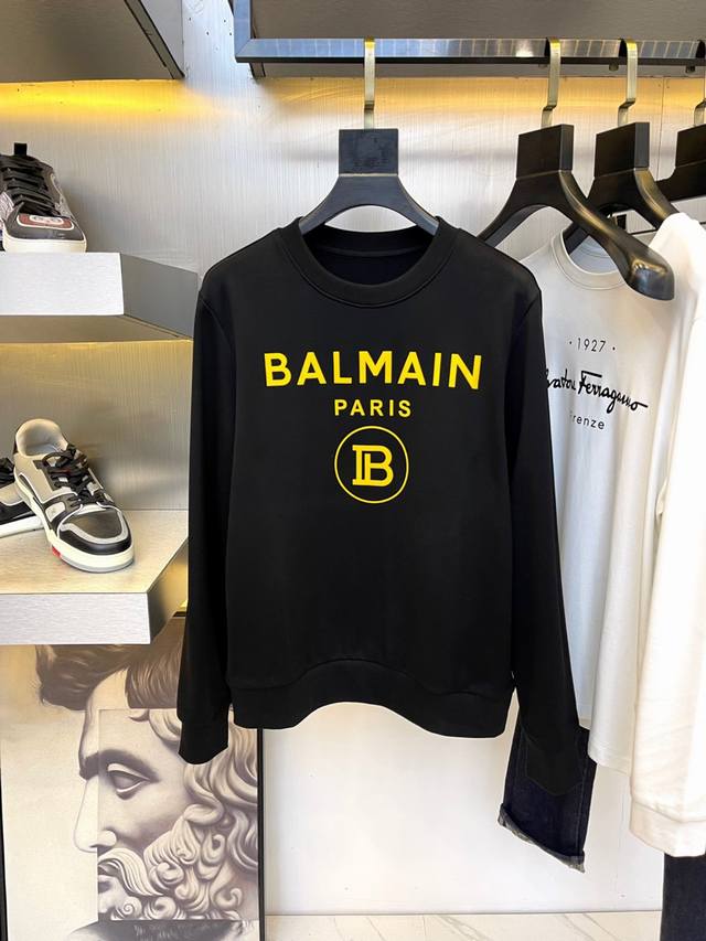 Balmain 巴尔曼 24Ss新款潮流经典卫衣，精致裁剪，高品质工艺！采用定织定染纯棉面料420克左右纯棉卫衣面料！图案进口数码印花工艺，耐穿耐洗久穿不变型，